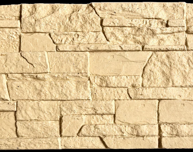 plaque de cloture en béton imitation pierre, vue détaillé de la pierre taillé du dessin de la plaque en béton